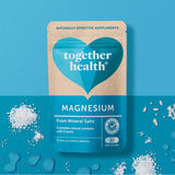 Together Magnesio Marino frasco cierre, formato práctico y seguro para almacenamiento.