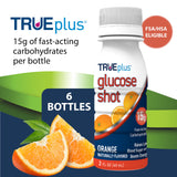TRUEplus shot de glucosa naranja, diseño portátil para uso en movimiento.
