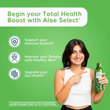 Vaso mostrando el Univera Aloe Select Mango para rutina diaria.