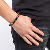Brazalete UroClysmic presentado en caja regalo elegante