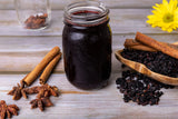 U.S. Wellness Naturals frasco de jarabe elaborado con saúco, sabor reconfortante