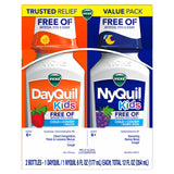 Vicks Kids DayQuil NyQuil, botella diurna con sabor a frutas para niños.