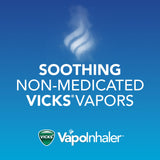 Vicks VapoInhaler en mano para uso discreto durante el dia