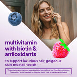 Vitafusion Gorgeous Hair Skin Nails raspberry flavor gummies on counter