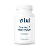 Vital Nutrients calcio magnesio vegano: botella volcada para dosificación diaria.