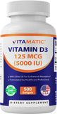 Vitamatic Vitamina D3 5000UI en botella de cápsulas para absorción mejorada