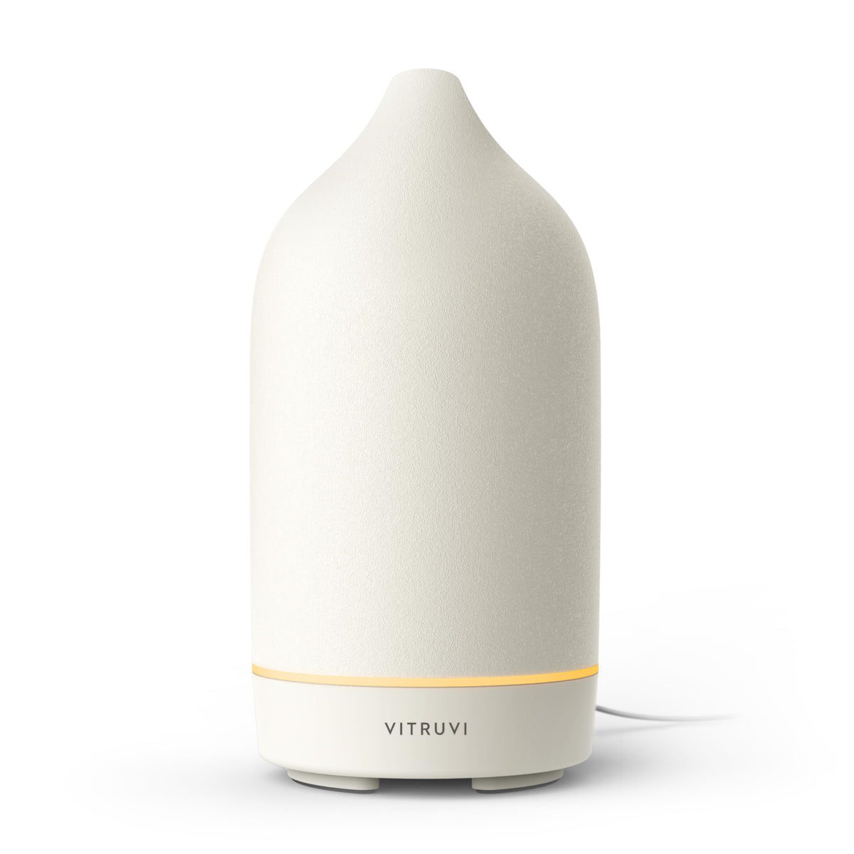 Vitruvi Stone: difusor cerámico, vista frontal, perfuma con aroma suave en el salón.