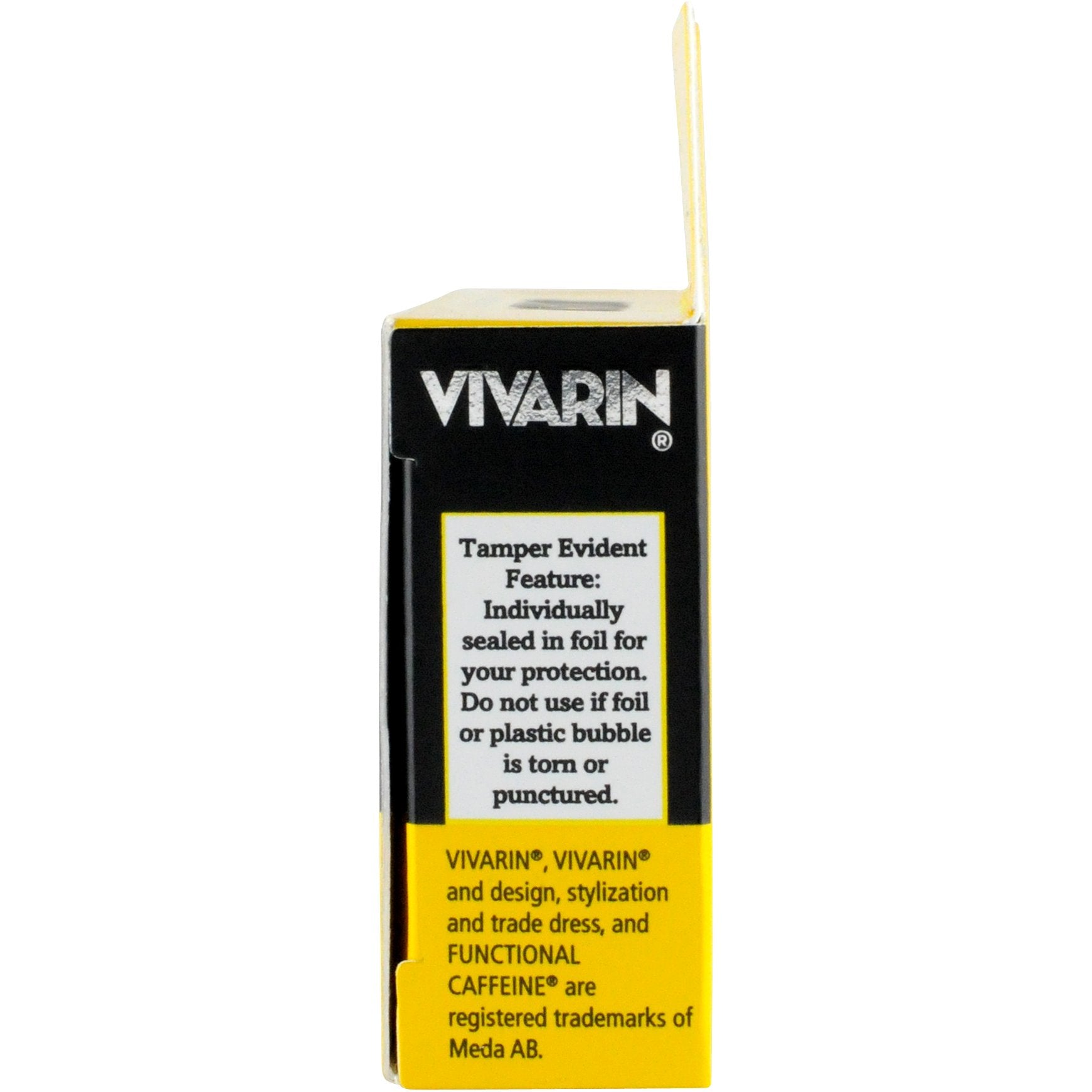 Vivarin tabletas en mano listas para tomar con agua.