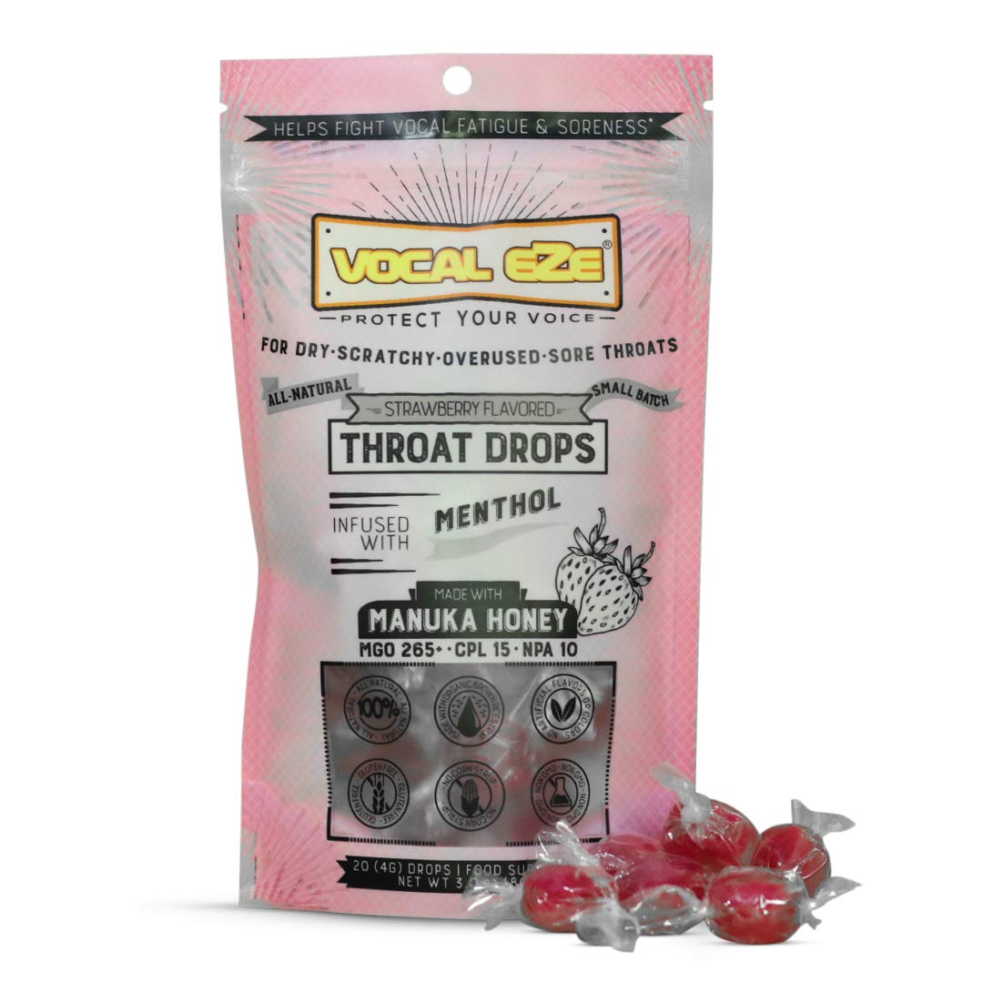 Vocal Eze Drops de Manuka con fresa y mentol, empaque compacto.