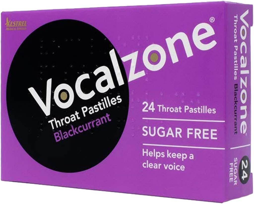 Pastillas Vocalzone en caja, apoyo suave para la garganta durante ensayos.