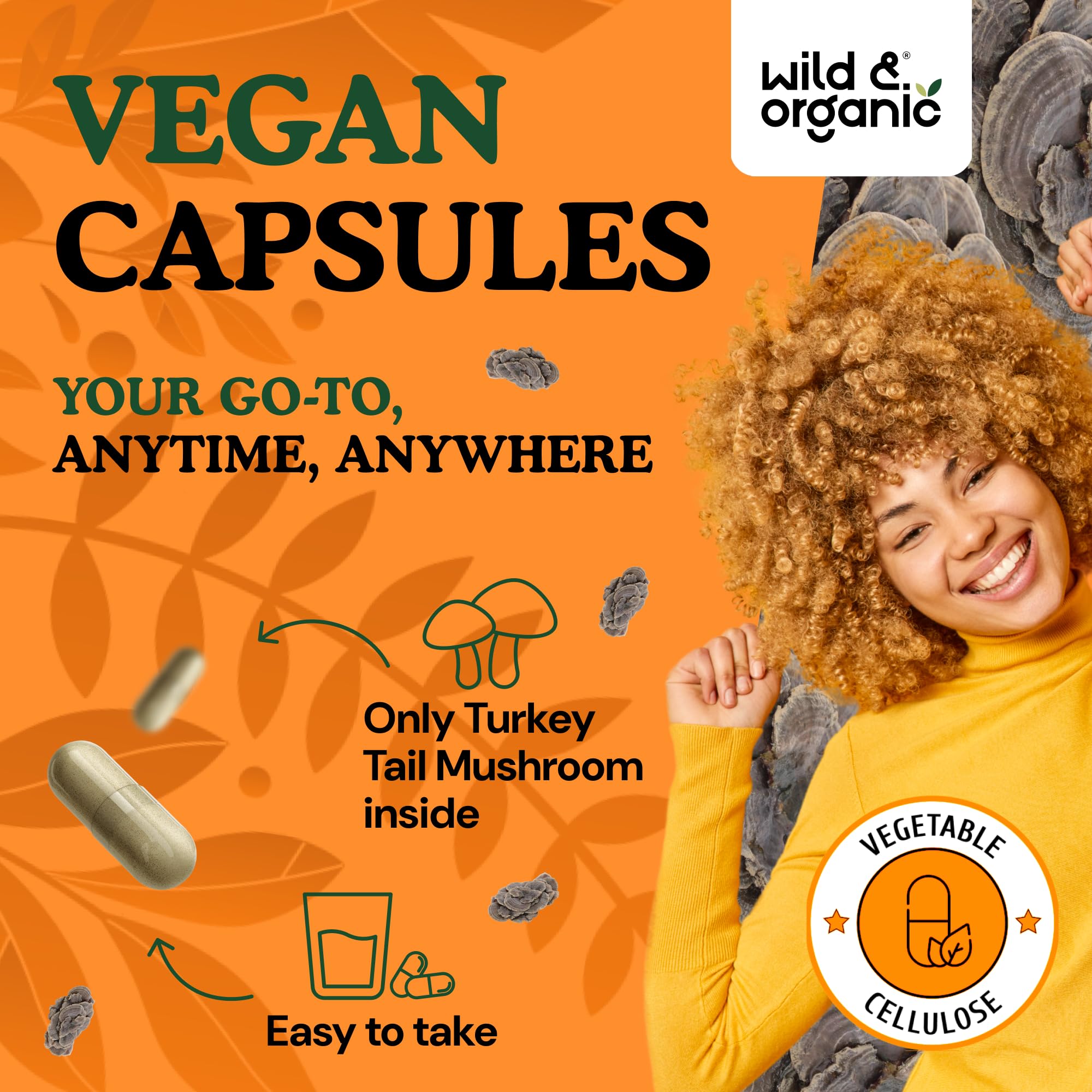 Wild & Organic cápsulas en mano para demostrar tamaño suave