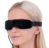 Parche ocular caliente de WIZARD RESEARCH durante la relajación para ojos irritados.