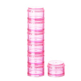 XIMYWRD organizador de pastillas de 7 días en rosa, ideal para viajes y organización diaria.