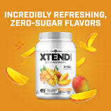 Vaso con Xtend Mango Locura preparado para la hidratación durante el entrenamiento.