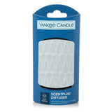 Difusor Yankee Candle ScentPlug con patrón orgánico gris para aroma continuo.
