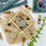 Bolsa regalo YATOJUZI para presentar el set de cuarzos con elegancia.