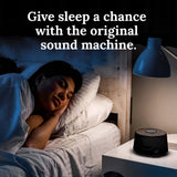 YOGASLEEP Dohm Classic negro, uso en oficina para privacidad acústica y concentración.