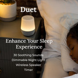 Yogasleep Duet luz nocturna ámbar suave para la rutina nocturna.
