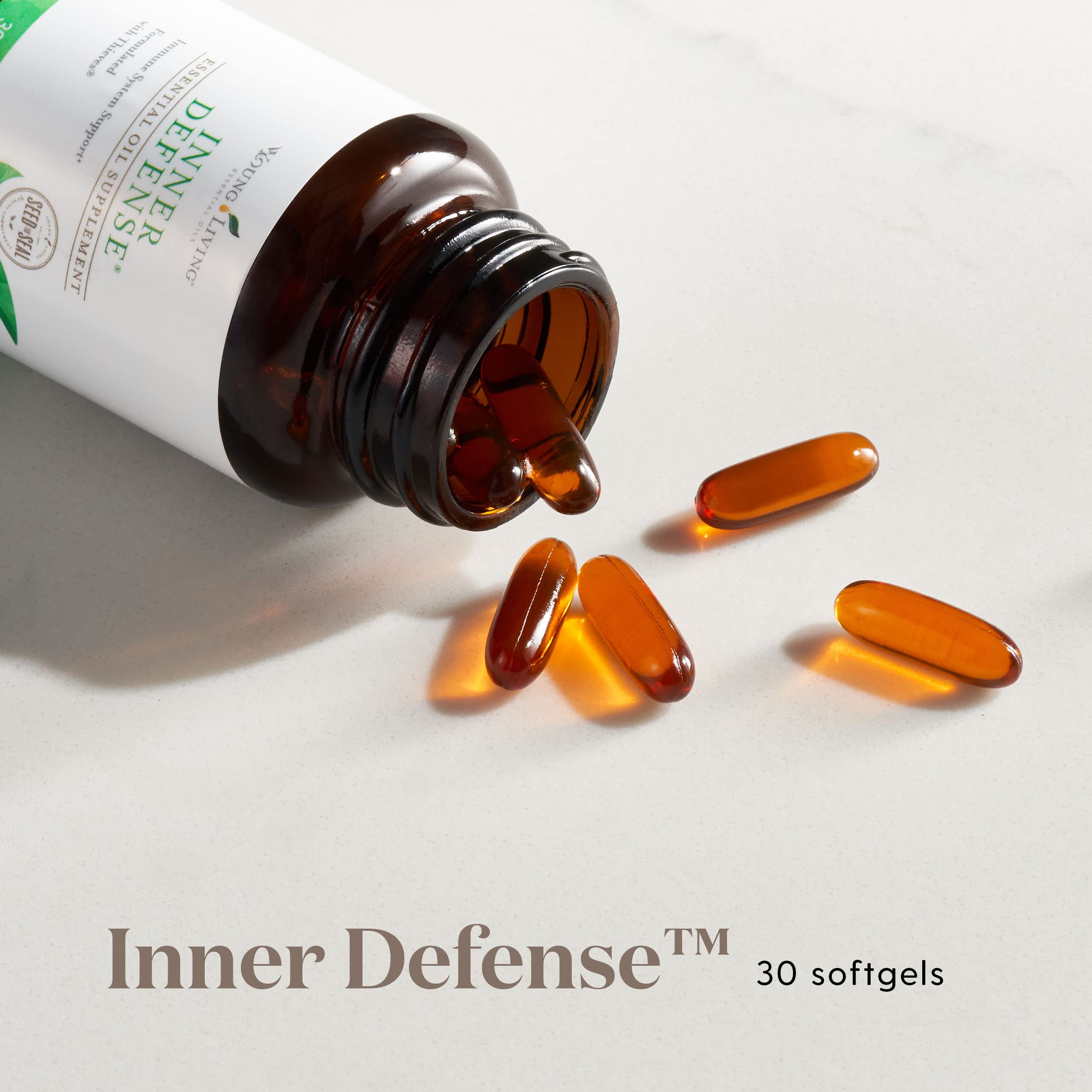 Young Living Defensa Interna, cápsulas líquidas, absorción rápida para rutina de bienestar.
