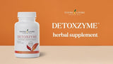 Botella de Detoxzyme con 90 cápsulas para uso diario.