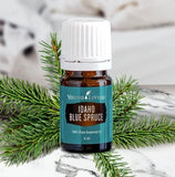 Masaje suave de músculos tensos con Idaho Blue Spruce de Young Living.