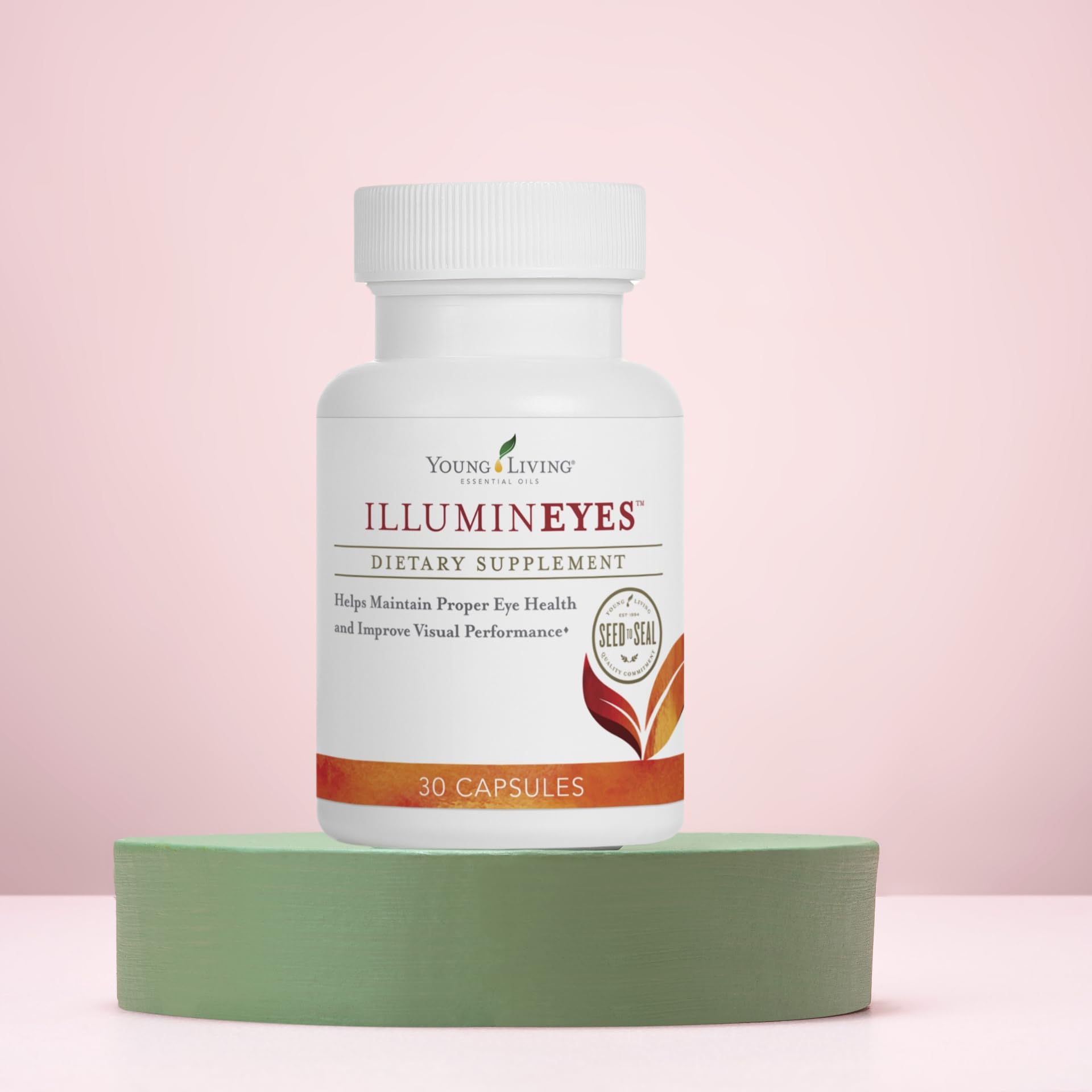 Young Living IlluminEyes primer plano de cápsula en fondo neutro.