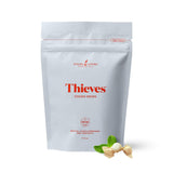 Young Living Thieves Cough Drops en botella de 30, sabor suave para uso diario.