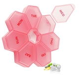 Zuiaso organizador semanal de pastillas en rosa, ideal para viajar sin perder dosis.