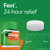 Zyrtec 24h, mano sosteniendo tabletas para uso diario.